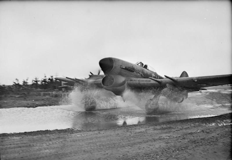 A Typhoon taking off in the wet.