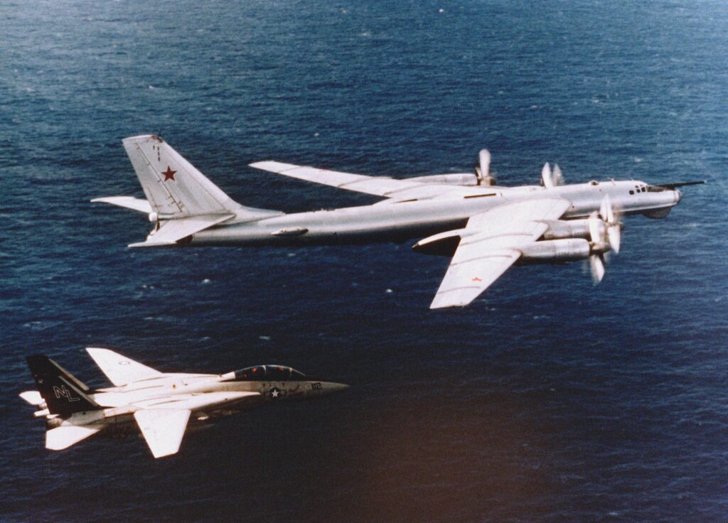 F-14 fighter aircraft intercepting a Tu-95.