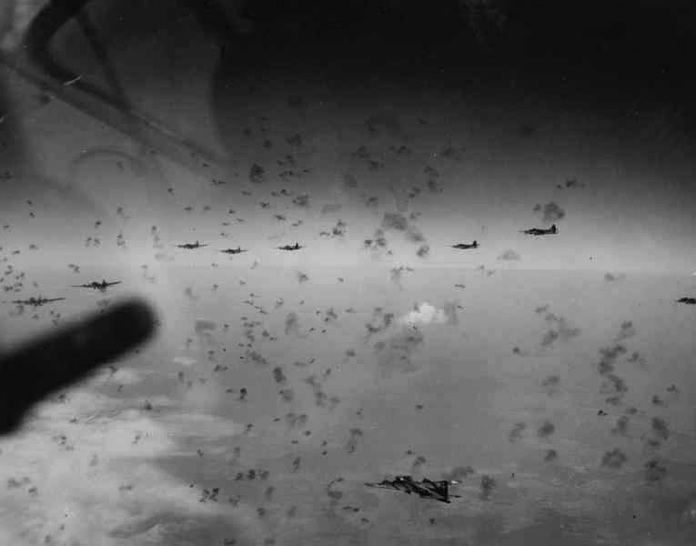 B-17s flying through flak clouds.