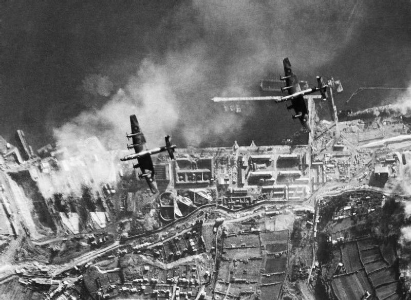 A pair of Halifax bombers during an attack.