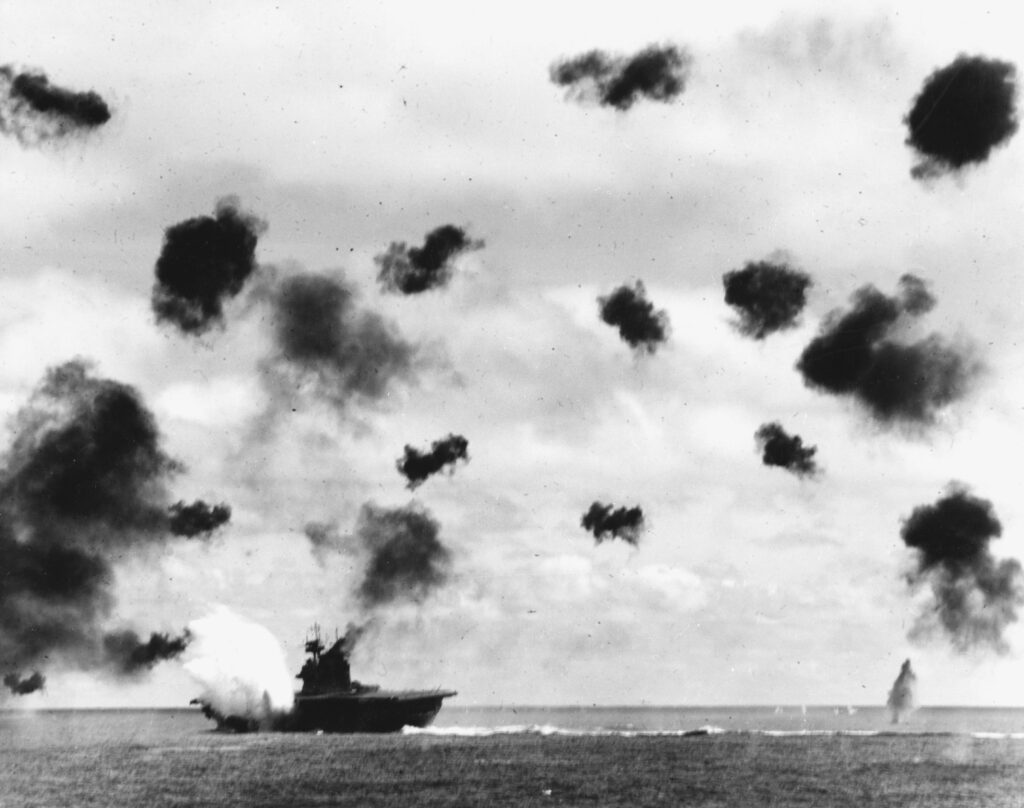 The USS Yorktown the moment it was hit by a torpedo.