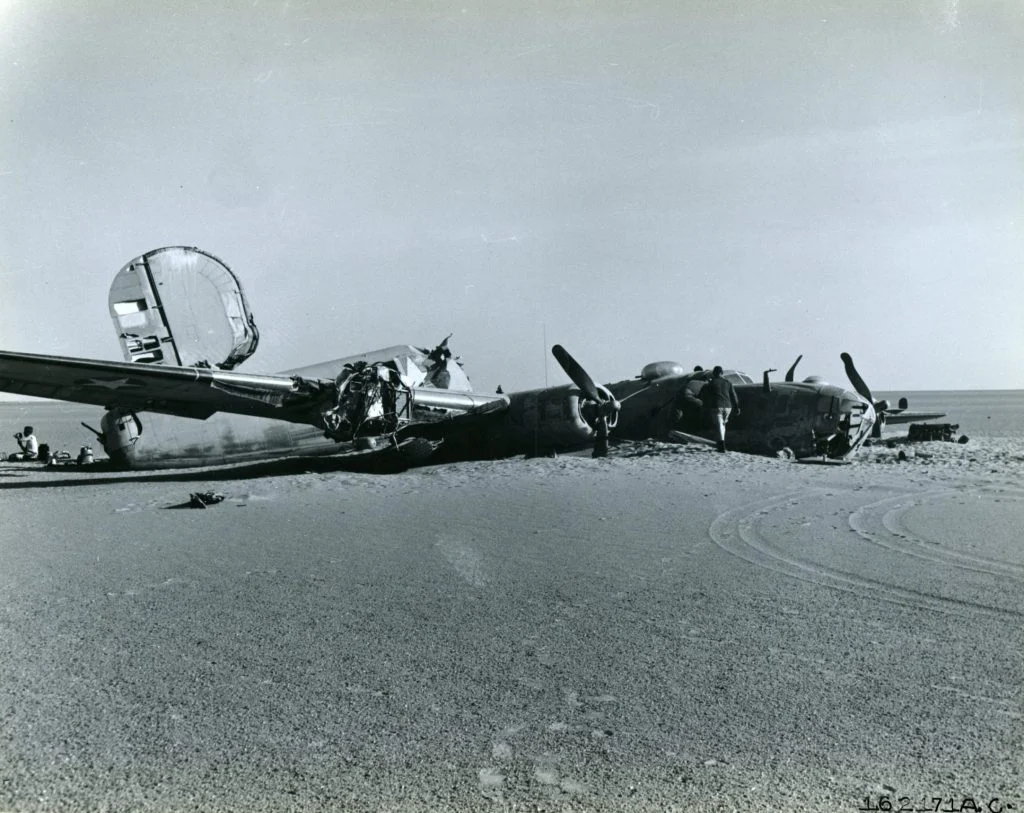 The B-24 sat in the featureless desert.