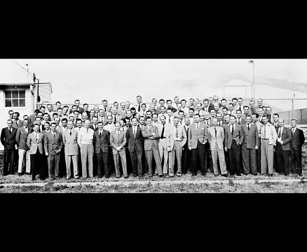 A group of 104 Operation Paperclip rocket scientists assemble at Fort Bliss, Texas