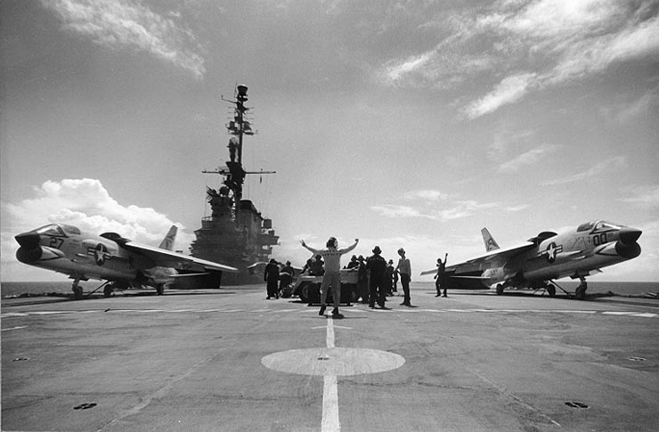 A pair of F-8s launching from the USS Midway in 1963.